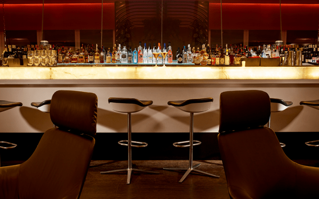 Interior Photographer Graham Atkins-Hughes shoots bar in  first class lounge for Virgin Heathrow London